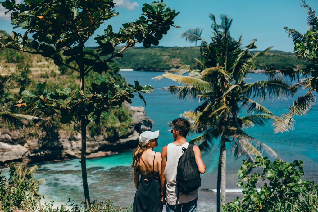 Beautiful young couple in Bali beach