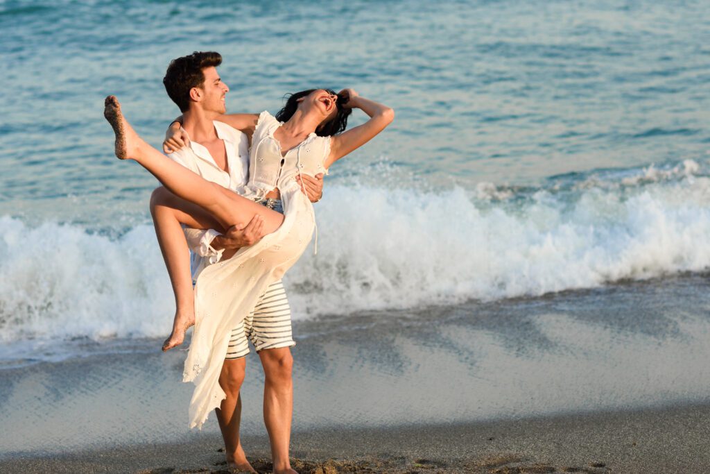 Young couple in a beautiful beach.